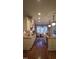 Well-appointed kitchen with granite countertops, island and stainless steel appliances for meal preparation at 901 Hollymont Dr, Holly Springs, NC 27540