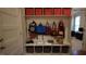 A well-organized mudroom entrance features hooks, cubbies, and storage bins for all your outdoor gear at 901 Hollymont Dr, Holly Springs, NC 27540