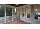 Enjoy the outdoors on this charming screened-in porch with wood floors and neighborhood views at 901 Hollymont Dr, Holly Springs, NC 27540