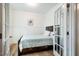 Bright bedroom with a queen bed, a modern minimalist design, and ample natural light at 91 Cliffdale Rd, Chapel Hill, NC 27516