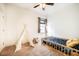 Bright bedroom featuring carpet, a single bed, and a play tent with a stuffed elephant at 91 Cliffdale Rd, Chapel Hill, NC 27516