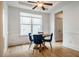 Dining room with stylish lighting and modern blue chairs at 91 Cliffdale Rd, Chapel Hill, NC 27516