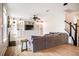 Spacious living room featuring built-in bookshelves, a fireplace, and hardwood floors at 91 Cliffdale Rd, Chapel Hill, NC 27516