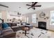 Open-concept layout with living room, fireplace, and bright kitchen at 91 Cliffdale Rd, Chapel Hill, NC 27516