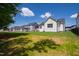 Home's backyard provides ample space, enhanced by meticulous landscaping at 928 Lily Claire Ln, Fuquay Varina, NC 27526