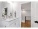 Bathroom with a white vanity, granite countertop, and modern finishes at 928 Lily Claire Ln, Fuquay Varina, NC 27526