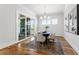 Bright dining area with sliding glass doors and hardwood floors at 928 Lily Claire Ln, Fuquay Varina, NC 27526