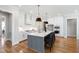 Spacious kitchen featuring stainless steel appliances, custom cabinetry, and a large island at 928 Lily Claire Ln, Fuquay Varina, NC 27526