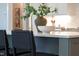 Close-up of kitchen island highlighting the quartz countertops and stylish decor at 928 Lily Claire Ln, Fuquay Varina, NC 27526