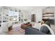 Cozy living area featuring custom built-ins and a wet bar for entertaining at 928 Lily Claire Ln, Fuquay Varina, NC 27526