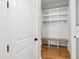 Well-organized mudroom with a built-in bench and cubbies at 928 Lily Claire Ln, Fuquay Varina, NC 27526