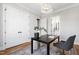 Well-lit office with desk, chair, and view of the adjoining bathroom at 928 Lily Claire Ln, Fuquay Varina, NC 27526