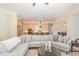 Bright, open-concept living space featuring a gourmet kitchen and comfortable living area at 101 Becklow Ridge Lane Ln, Holly Springs, NC 27540