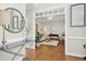 Inviting open-concept living area featuring hardwood flooring, decorative trim, and neutral paint palette at 101 Silk Leaf, Cary, NC 27518