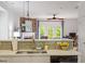 Kitchen with stone countertops overlooks living room at 1029 Frank Page Dr, Cary, NC 27519