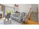 Bright living room boasts hardwood floors and direct access to the staircase at 1029 Frank Page Dr, Cary, NC 27519