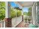 Relaxing porch with views of lush greenery and a blue sky at 1029 Frank Page Dr, Cary, NC 27519