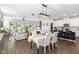 Open concept living space with modern decor, a dining area, and a spacious kitchen at 1036 S Fieldhaven Dr, Fuquay Varina, NC 27526