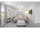 Comfortable main bedroom featuring a bed, bedside tables, and stylish decor accents at 1036 S Fieldhaven Dr, Fuquay Varina, NC 27526