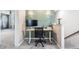 Dedicated workstation area featuring a modern desk, comfortable chair, and stylish wall decor at 1036 S Fieldhaven Dr, Fuquay Varina, NC 27526