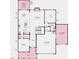 Detailed floor plan of the home showcasing the layout of the kitchen, dining, living areas, and garage at 104 Sodalite Ln, Holly Springs, NC 27540
