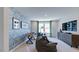 Inviting game room featuring a foosball table and comfortable seating at 104 Sodalite Ln, Holly Springs, NC 27540