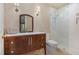 Updated bathroom featuring vanity with sink, mirror, toilet and glass enclosed shower with subway tile at 108 Monarch Way, Cary, NC 27518