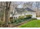 Beautiful home featuring a back porch and lush landscaping at 108 Monarch Way, Cary, NC 27518