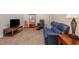 Cozy living room with wood flooring, and comfortable seating at 108 Monarch Way, Cary, NC 27518