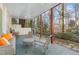 Covered patio with outdoor seating and a view of the backyard at 108 Monarch Way, Cary, NC 27518