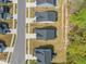 An aerial shot shows well-maintained lawns, sidewalks, and mature landscaping at 1120 Copper Beech Ln, Wake Forest, NC 27587