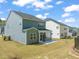 The spacious backyard offers a screened porch and easy access to community amenities at 1120 Copper Beech Ln, Wake Forest, NC 27587