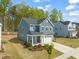 Beautiful two-story home featuring a manicured front lawn and attached two-car garage at 1120 Copper Beech Ln, Wake Forest, NC 27587