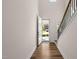 Welcoming foyer with hardwood floors, a staircase, and plenty of natural light at 1120 Copper Beech Ln, Wake Forest, NC 27587