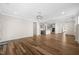 Spacious living area with hardwood floors, open layout to the kitchen and lots of natural light at 1120 Copper Beech Ln, Wake Forest, NC 27587