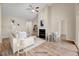 Inviting living room featuring a cozy fireplace, vaulted ceilings, and hardwood floors at 1123 Claret Ln, Morrisville, NC 27560
