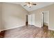 Spacious bedroom with ceiling fan and ensuite bath at 1123 Claret Ln, Morrisville, NC 27560