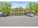 Spacious parking lot for residents and guests, surrounded by lush greenery and classic architecture at 1123 Claret Ln, Morrisville, NC 27560
