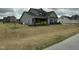 A spacious backyard enclosed by a black fence provides privacy and room for outdoor fun at 116 Polenta Fields Dr, Smithfield, NC 27577