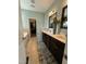 Double vanity with marble countertop in a spacious bathroom with walk-in closet at 116 Polenta Fields Dr, Smithfield, NC 27577