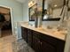 Bright bathroom features a double vanity, marble countertops, and modern fixtures at 116 Polenta Fields Dr, Smithfield, NC 27577