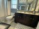 Full bathroom with shower-tub combo, double sink vanity, and dark blue walls at 116 Polenta Fields Dr, Smithfield, NC 27577