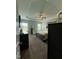 Well-lit bedroom features a tray ceiling, neutral décor, and comfortable furniture at 116 Polenta Fields Dr, Smithfield, NC 27577