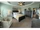 This stylish bedroom showcases natural light, calm colors, and modern furniture for a relaxing space at 116 Polenta Fields Dr, Smithfield, NC 27577