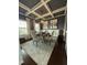 Elegant dining room features a stylish chandelier and wainscoting at 116 Polenta Fields Dr, Smithfield, NC 27577