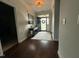 Inviting entryway features hardwood floors, stylish decor, and a welcoming rug at 116 Polenta Fields Dr, Smithfield, NC 27577