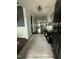 Welcoming entryway with dark hardwood floors and an elegant rug at 116 Polenta Fields Dr, Smithfield, NC 27577