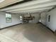 Bright garage with painted floor, natural light, and organized shelving at 116 Polenta Fields Dr, Smithfield, NC 27577