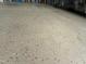 Garage floor with speckled epoxy finish at 116 Polenta Fields Dr, Smithfield, NC 27577
