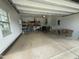 Clean, bright garage space with epoxy flooring and shelving at 116 Polenta Fields Dr, Smithfield, NC 27577